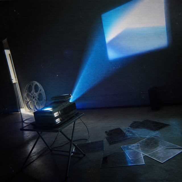 An old film projector, reel, and acetate sheets sit in a rehearsal room crossed by a cobalt projection beam.